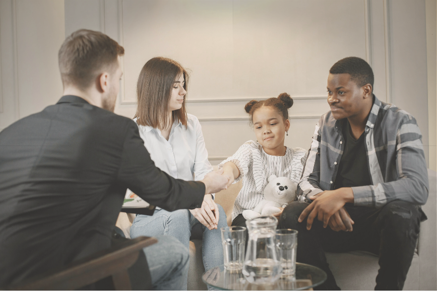 Couple discussing divorce mediation with a neutral third party