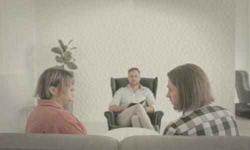 Couple discussing divorce mediation with a neutral third party
