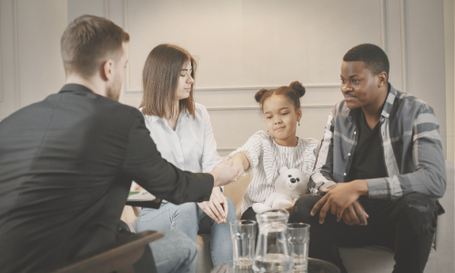 Couple discussing divorce mediation with a neutral third party